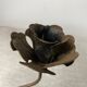 Rose shaped metal candle holder