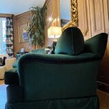 Paire de fauteuils en velours vert avec accoudoirs