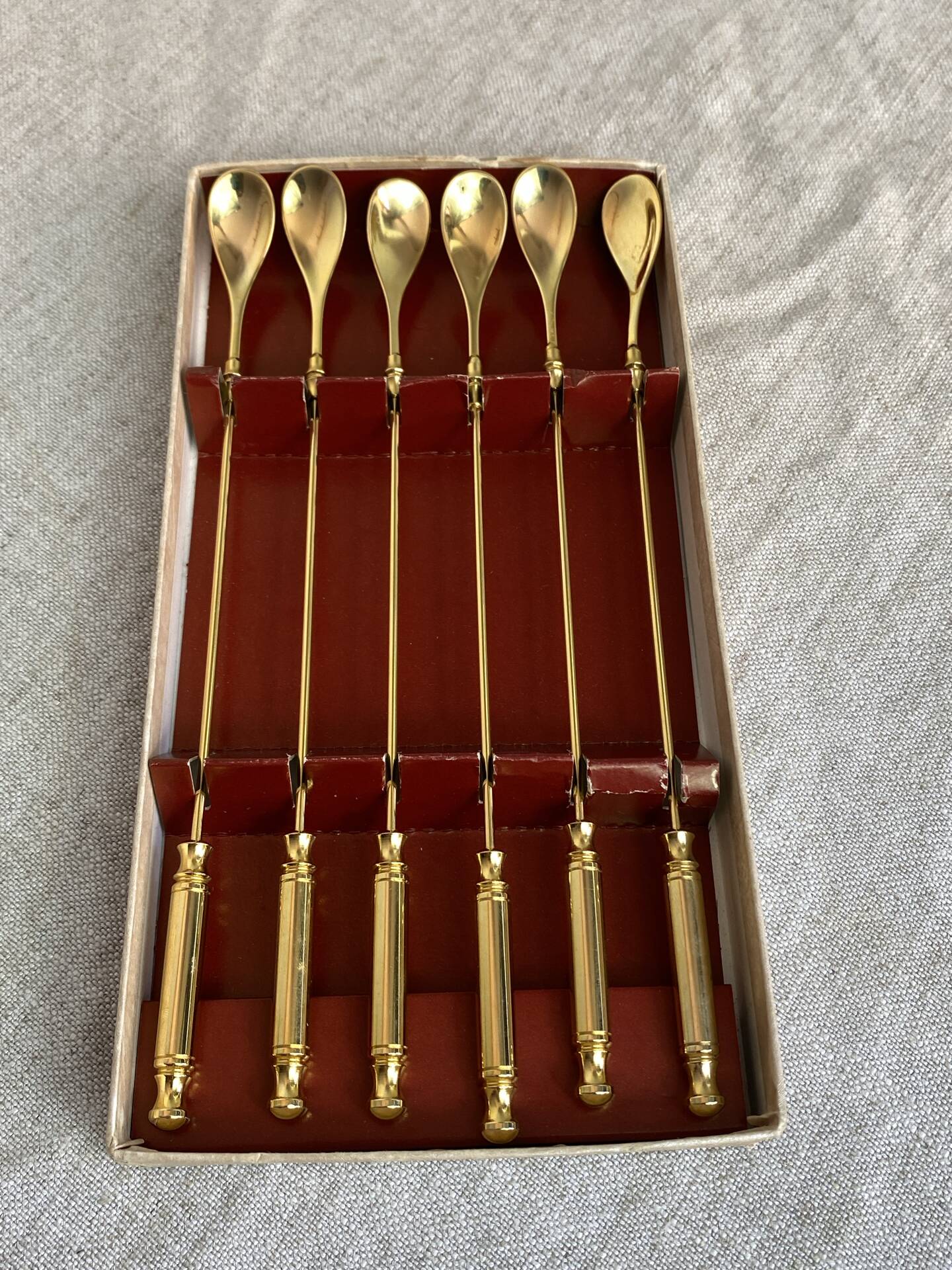 Long coffee or cocktail spoons in gold plating