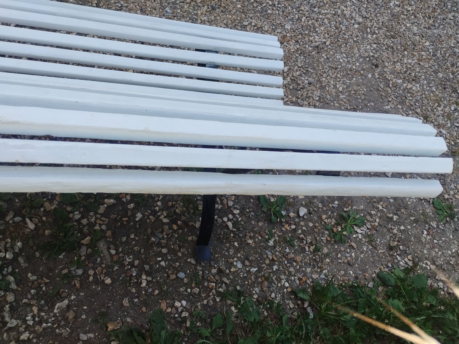 Antique garden bench with cast iron legs