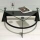 Table basse italienne moderne et contemporaine en métal noirci et plateau en verre