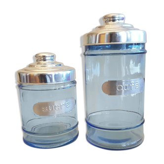 Pair of kitchen jars condiments in blue glass and aluminum for coffee and sugar