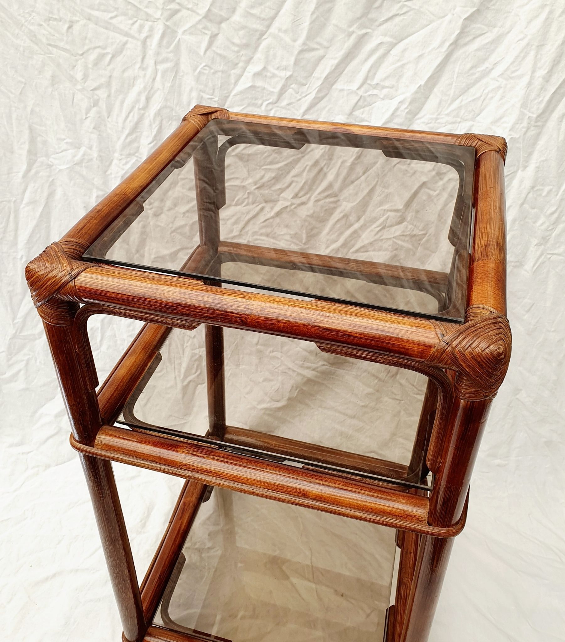 Rattan and smoked glass side table