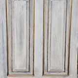 Antique library patinated in whitewashed white