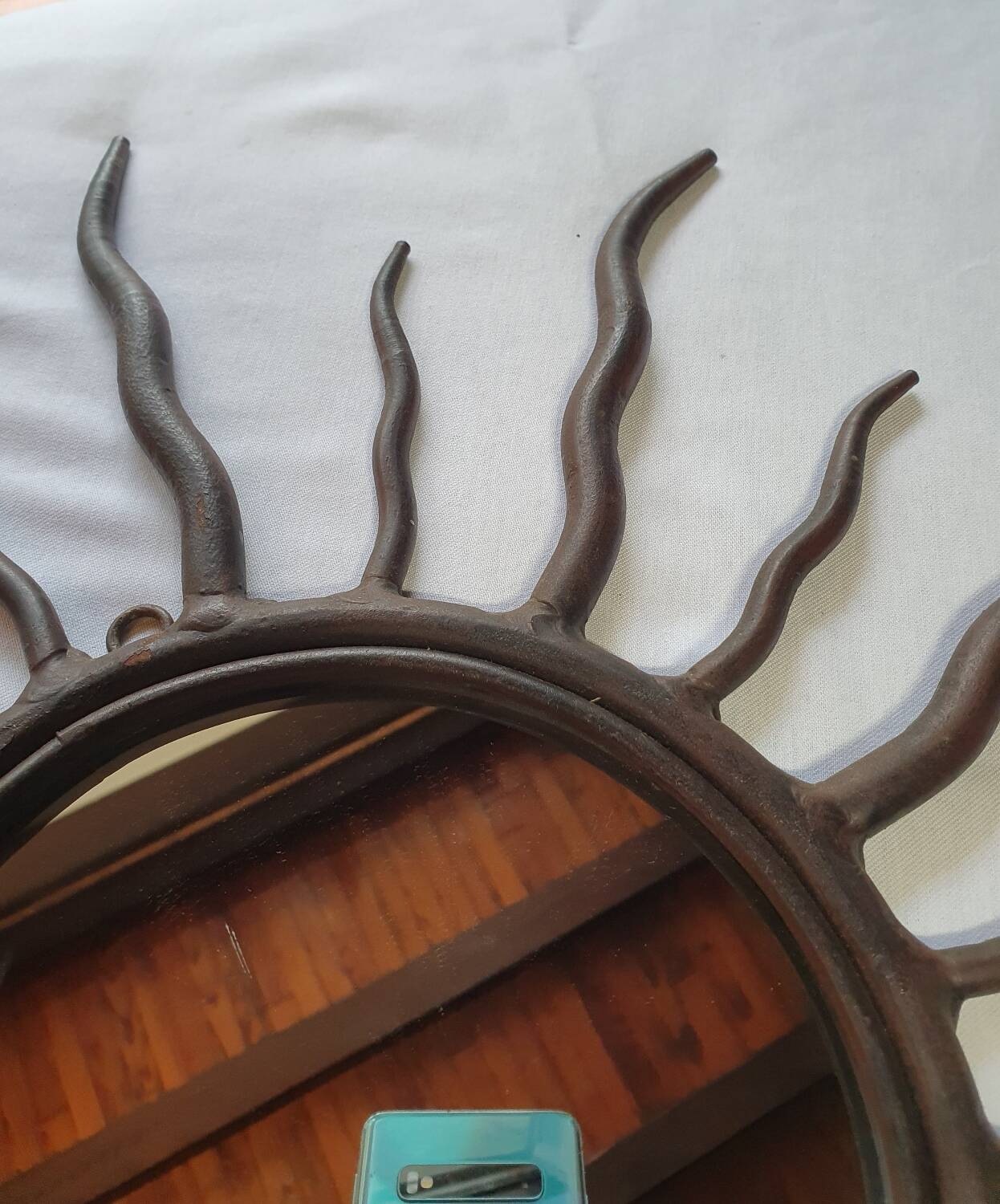 Solid wrought iron sun mirror