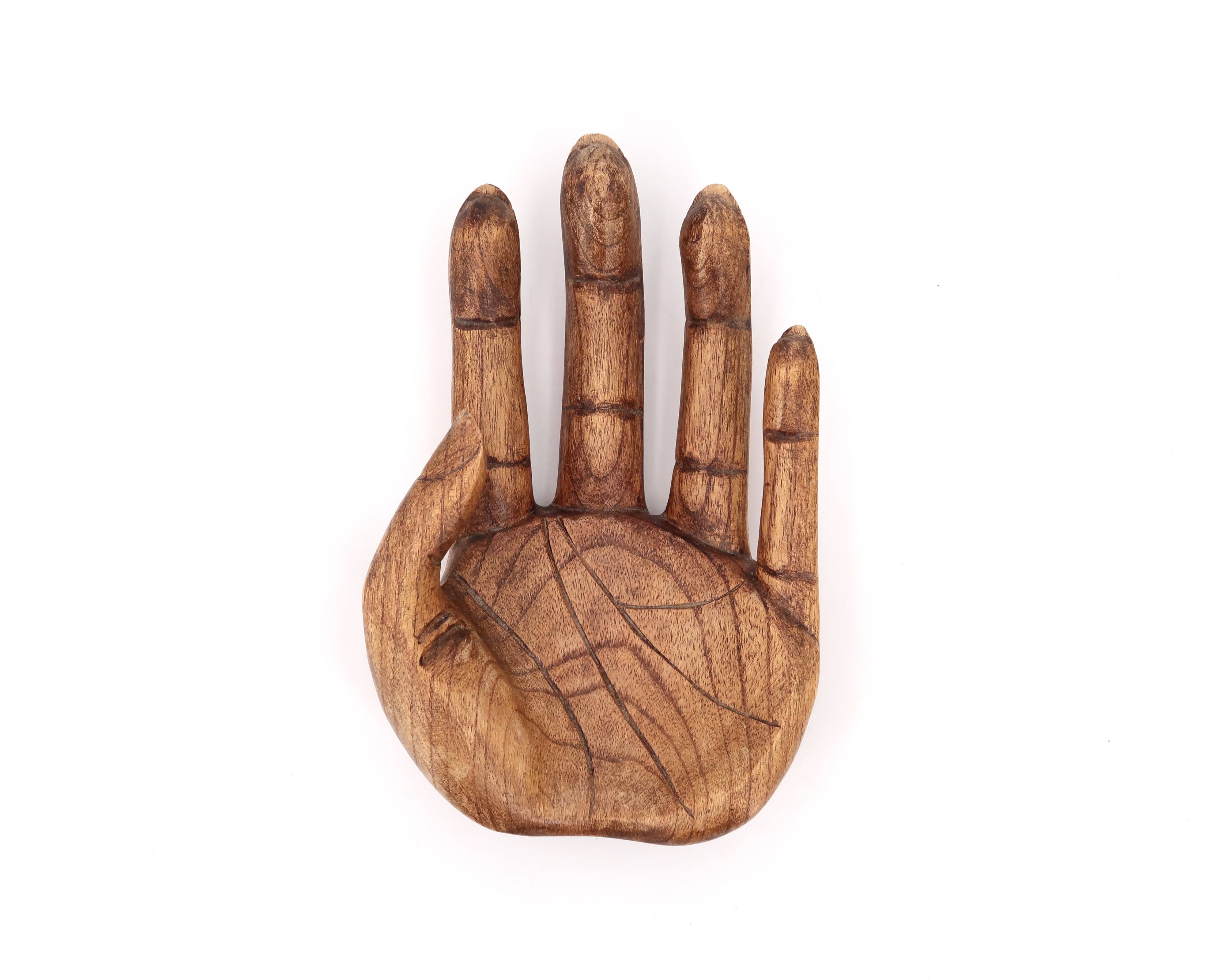 Empty wooden pocket in the shape of a hand, vintage