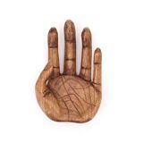 Empty wooden pocket in the shape of a hand, vintage