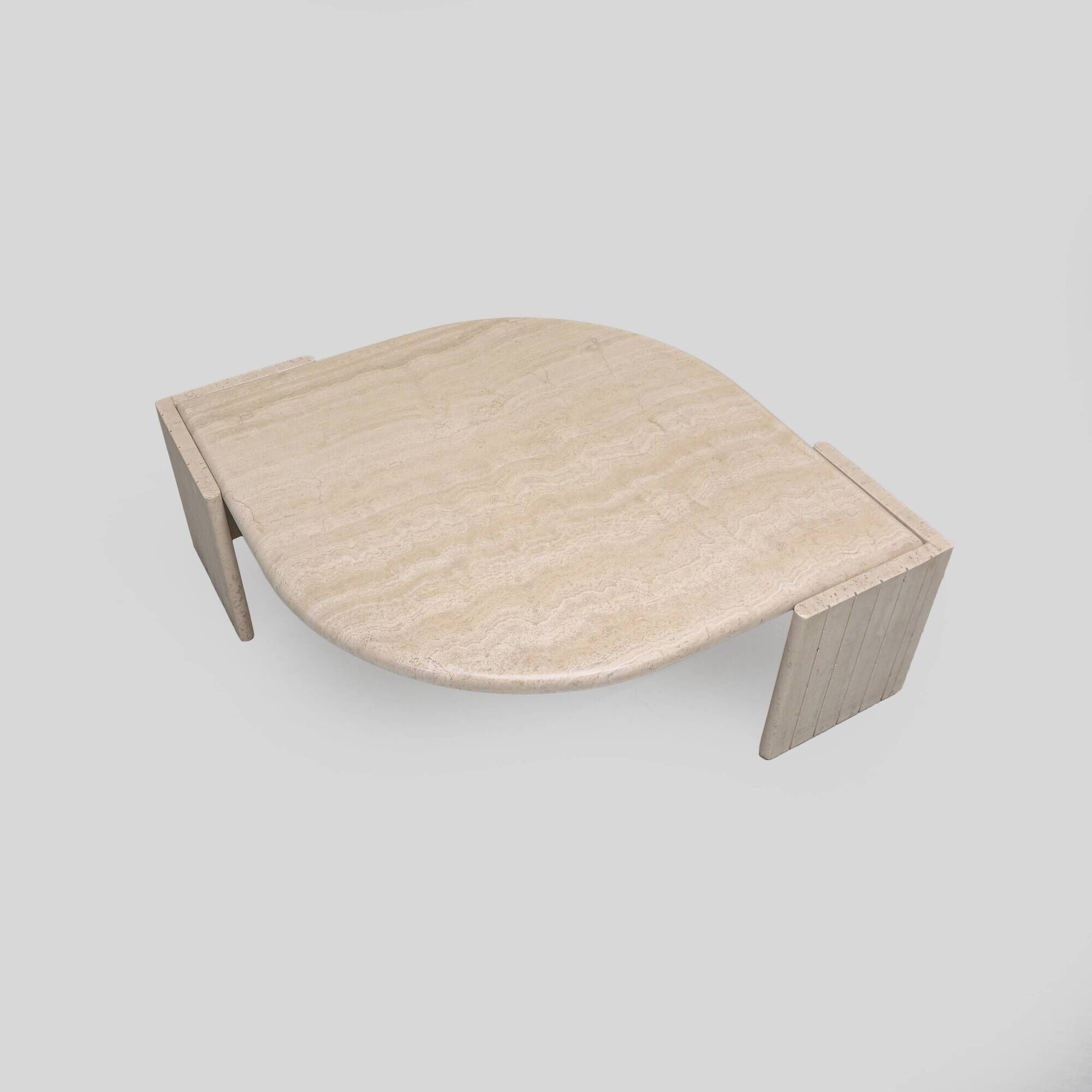 Vintage 'teardrop' travertine coffee table, Italy, 1970s.