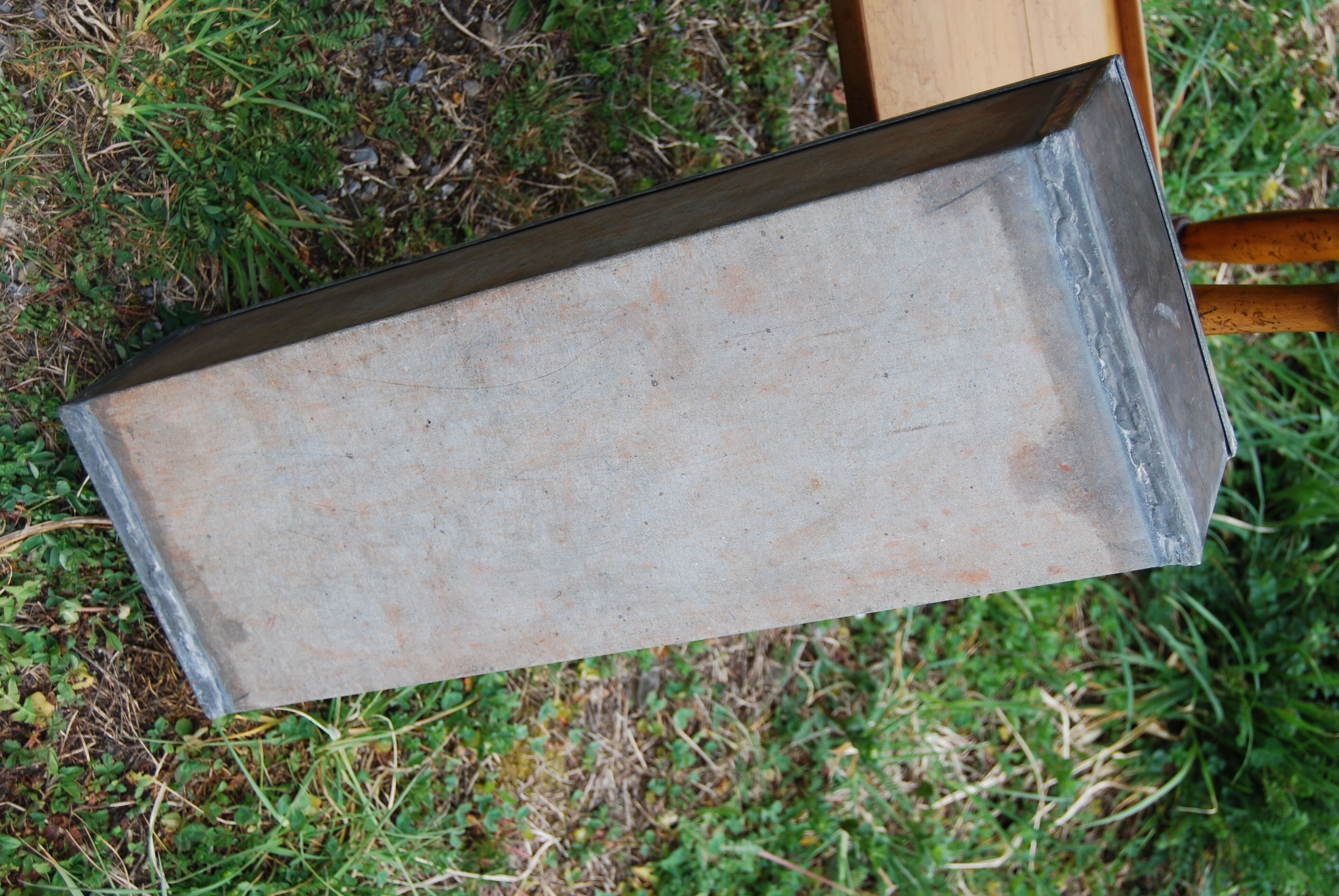 Executive-style indoor planter on feet