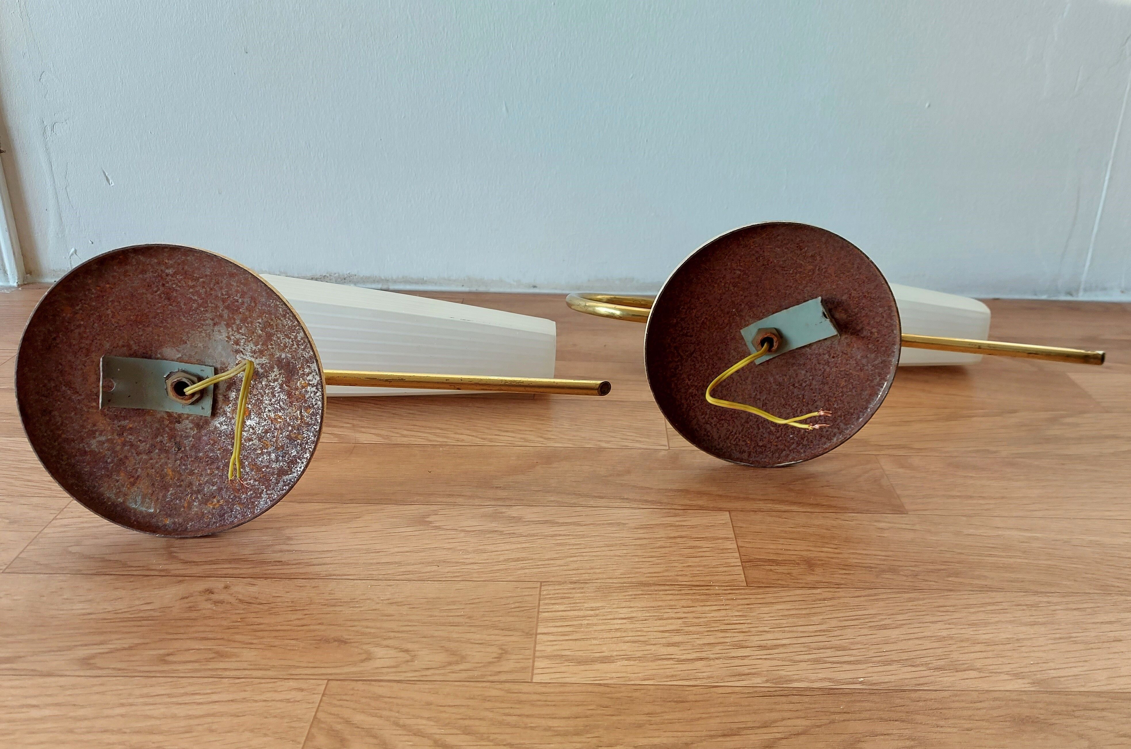 Pair of sconces with a light arm, brass and white opaline 1960.