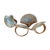 Rounds of golden metal shell towels