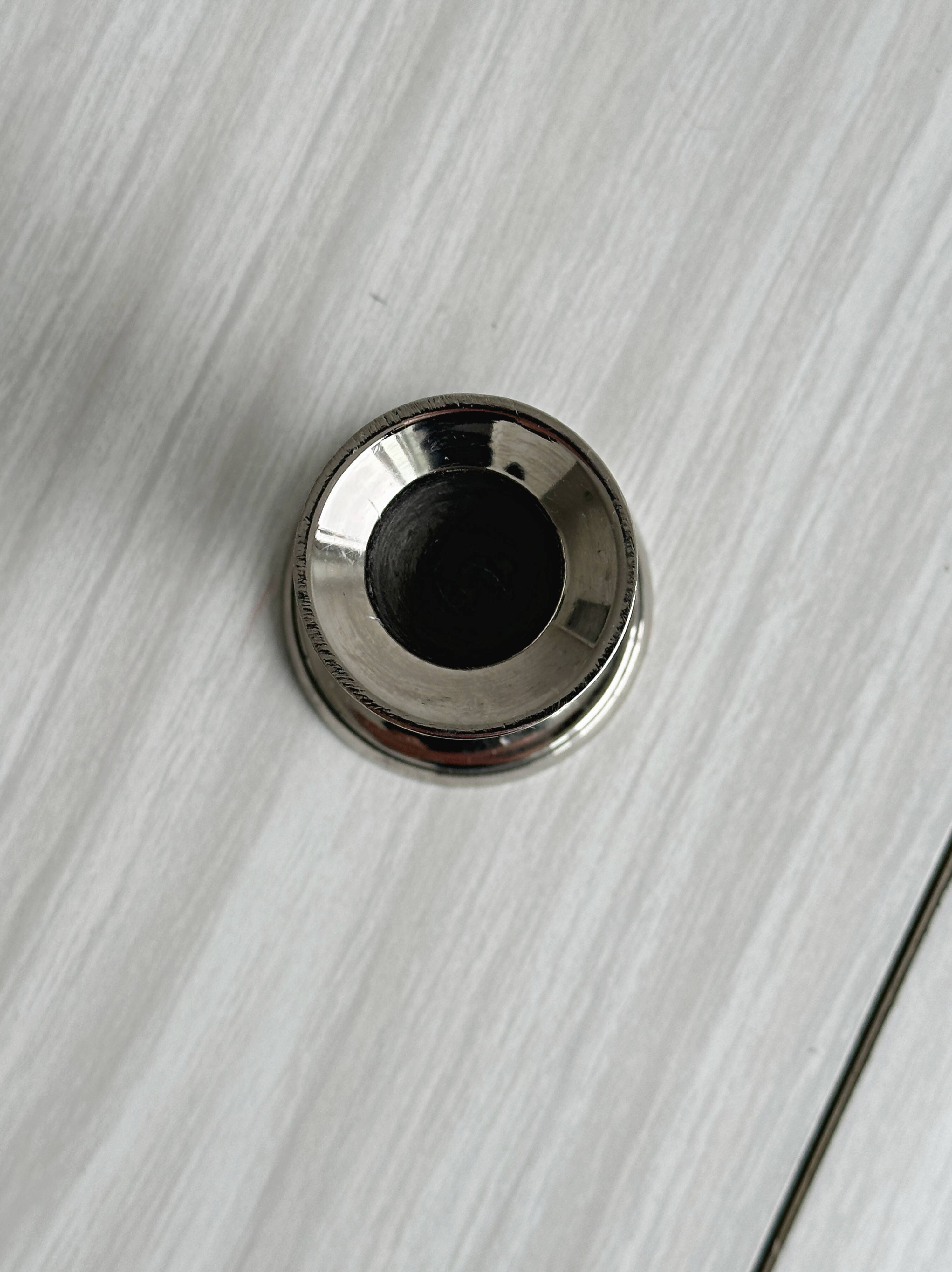 Small lightweight metal candlestick