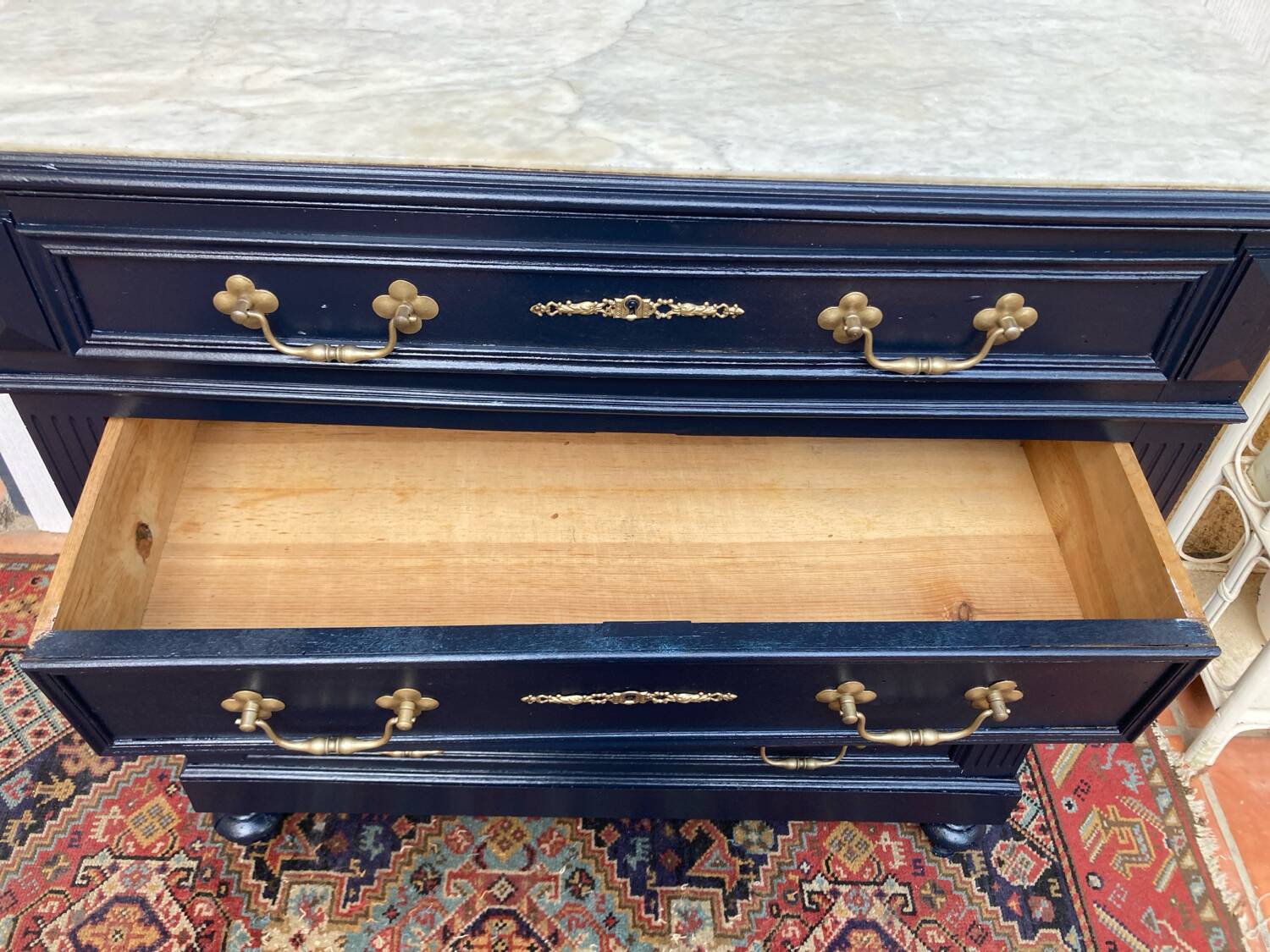 Chest of drawers with marble