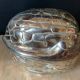 Walnut-shaped box in silver metal