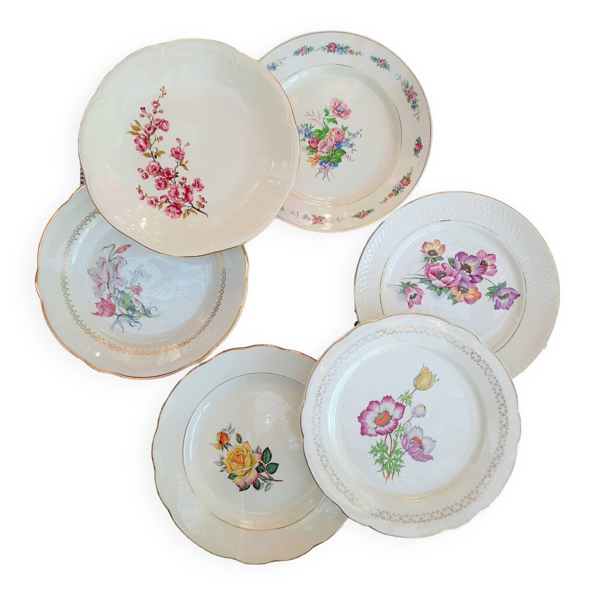 Old flat plates mismatched in earthenware