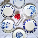 Mismatched antique flat plates in earthenware