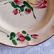 Earthenware plate from St Clément with tulip decoration.