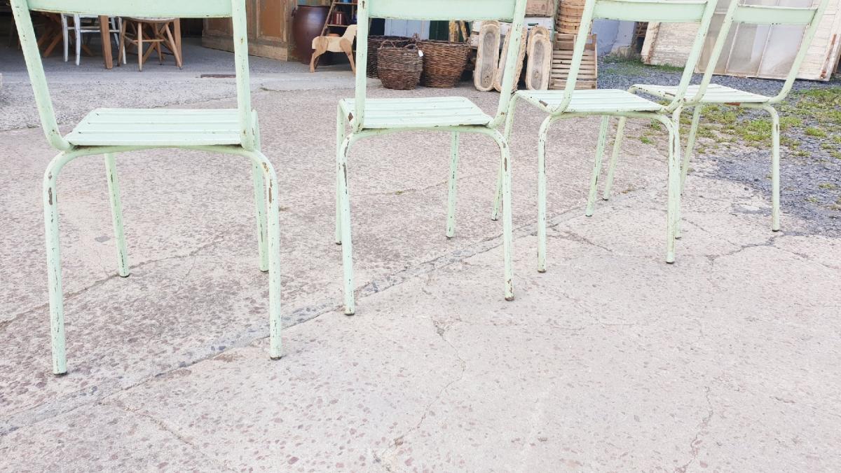 Four vintage metal chairs