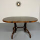 Vintage dining table with a cane top by Mundus from the 1970s.