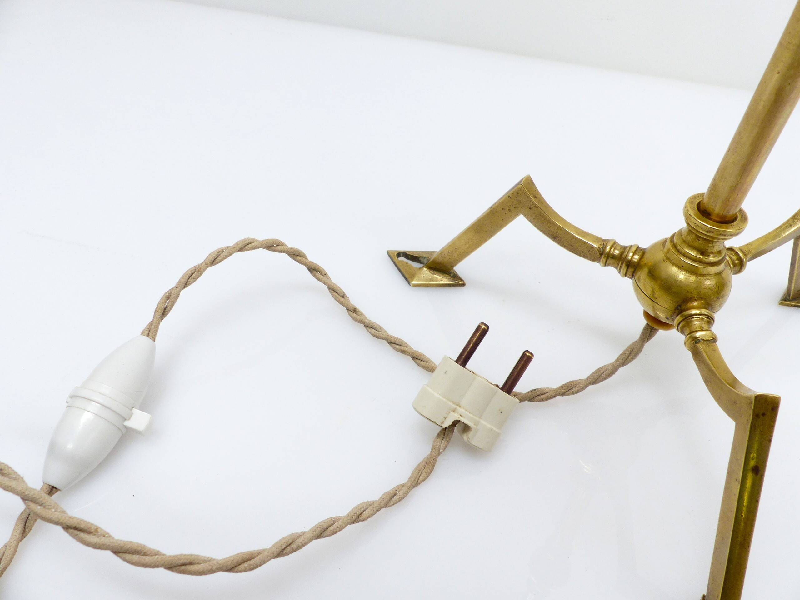 Articulated tripod lamp base in brass, Arts & Crafts style, in the manner of.