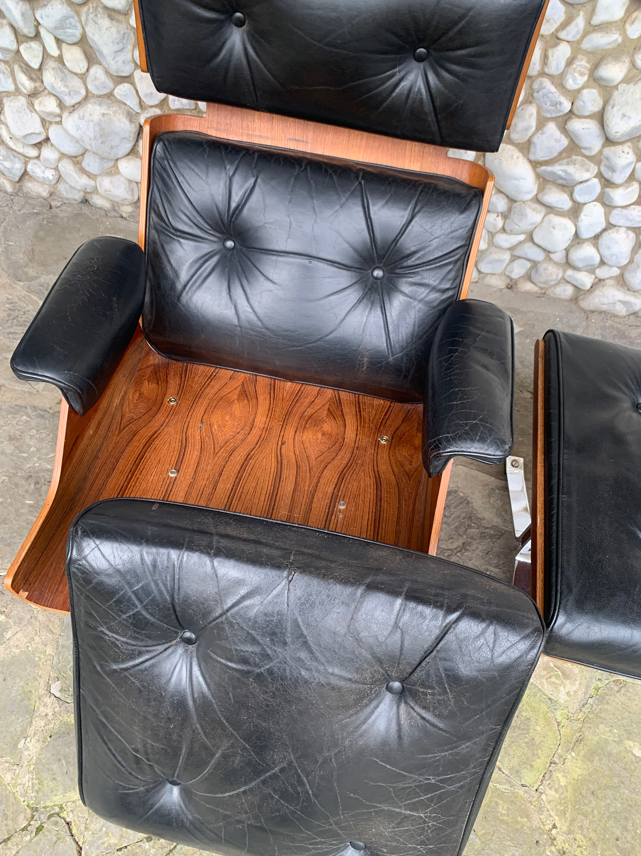 Lounge chair and ottoman black leather and teak multiplex, 1960