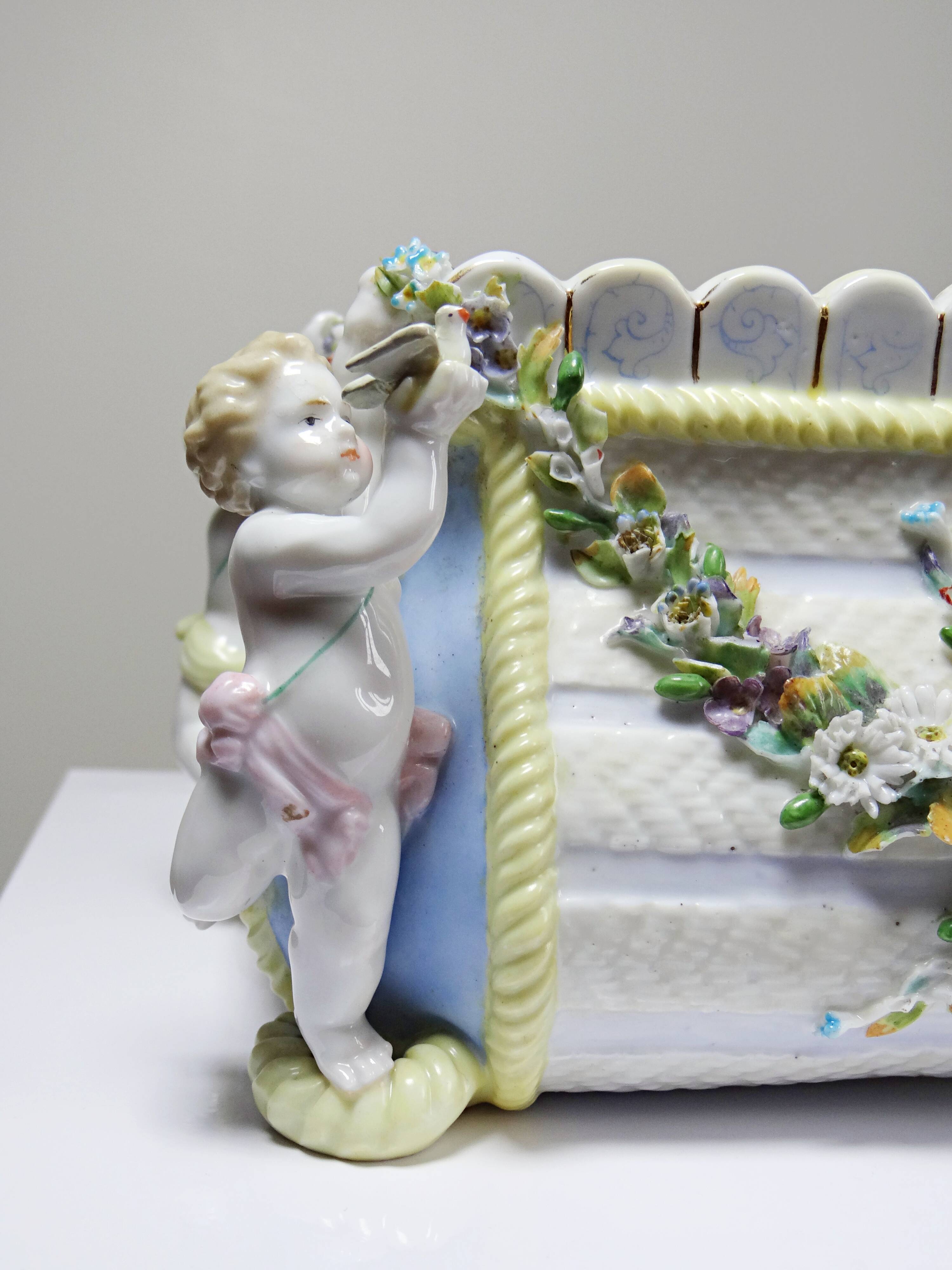 Small antique German porcelain planter Putti 19th century Meissen style