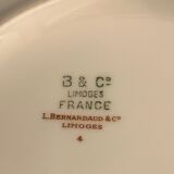 10 hollow porcelain plates from Limoges Bernardaud, gilded Greek decoration, twentieth century