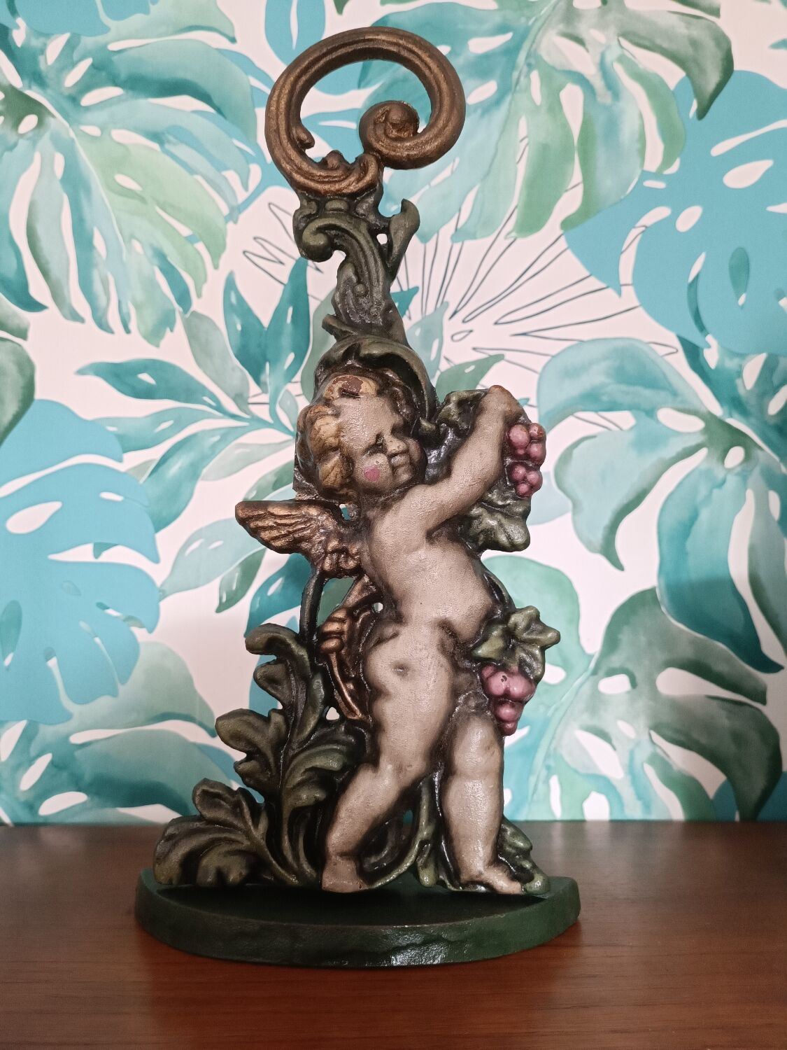 Cast iron door block cherub