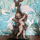 Cast iron door block cherub