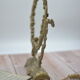 Adjustable psyche mirror of 33 centimeters in gilded bronze with angel ornament