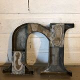 Blue metal letter "N"