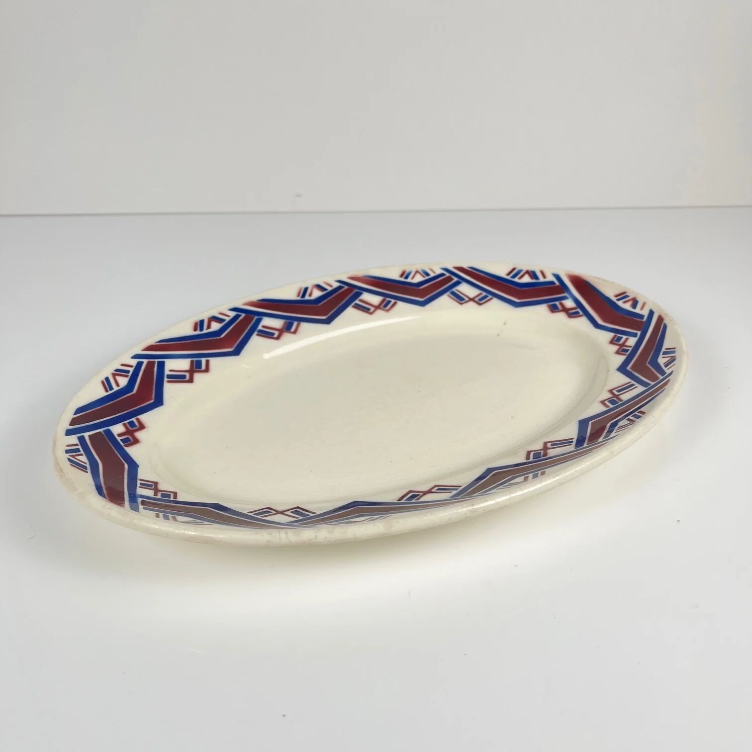 Antique oval plate "Babylon", Badonviller, 1900