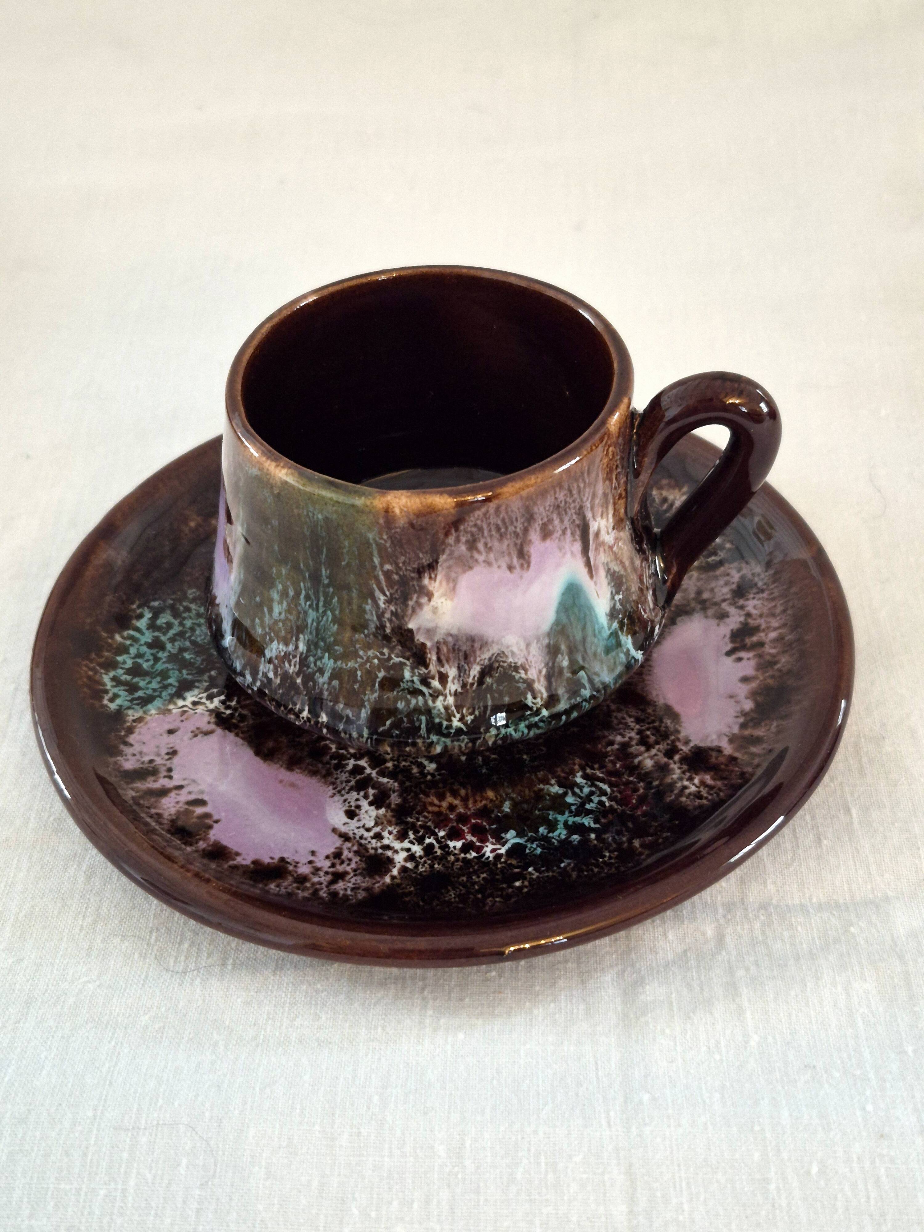 Six cups and saucers Vallauris glazed ceramic in brown and old pink.