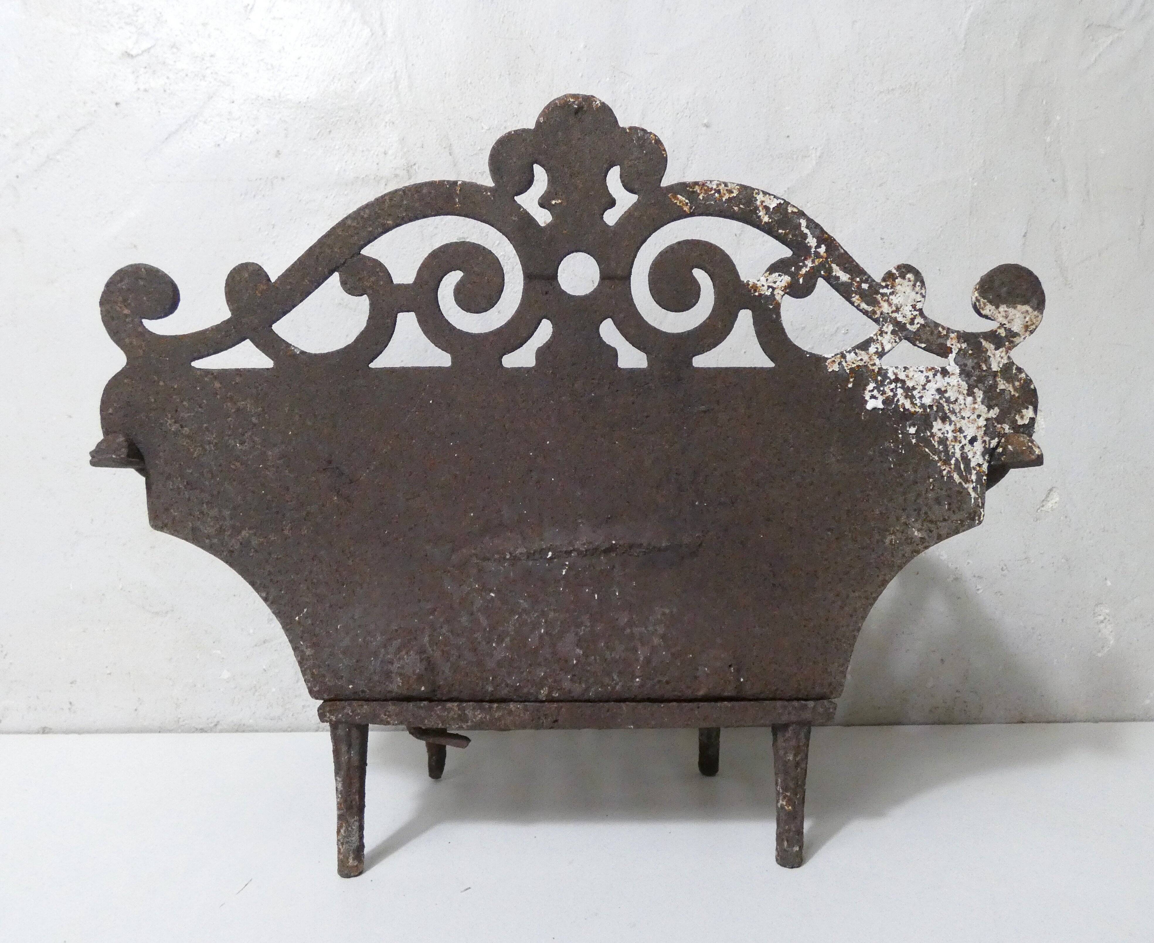 vintage cast iron log holder