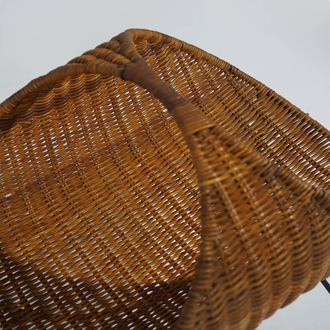 Rattan magazine rack with metal legs, 1950s