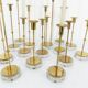 Set of 15 Scandinavian candle holders in brass and glass, Gunnar Ander, Ystad Met