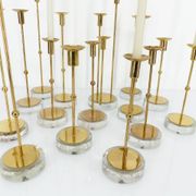 Set of 15 Scandinavian candle holders in brass and glass, Gunnar Ander, Ystad Met