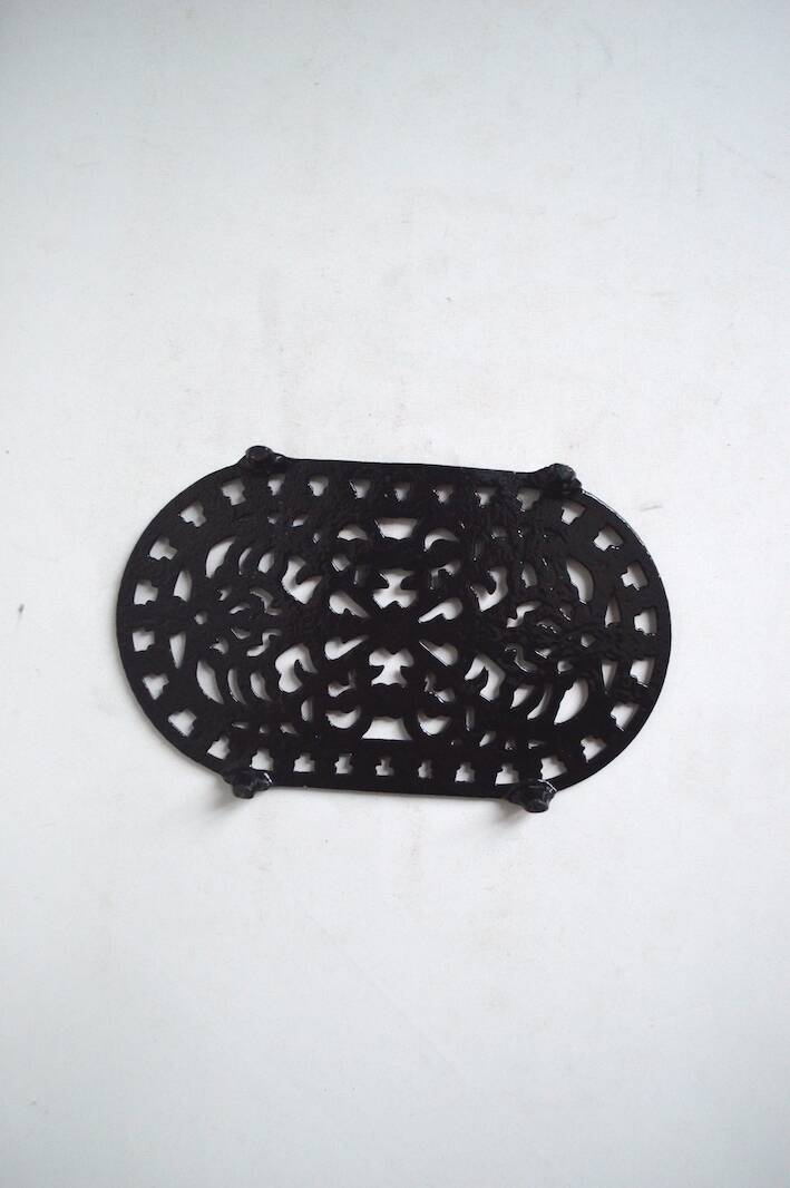 Black cast iron trivet
