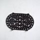 Black cast iron trivet