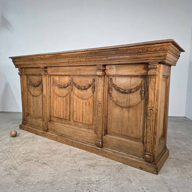 Important oak bar from a café around 1900.