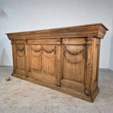 Important oak bar from a café around 1900.