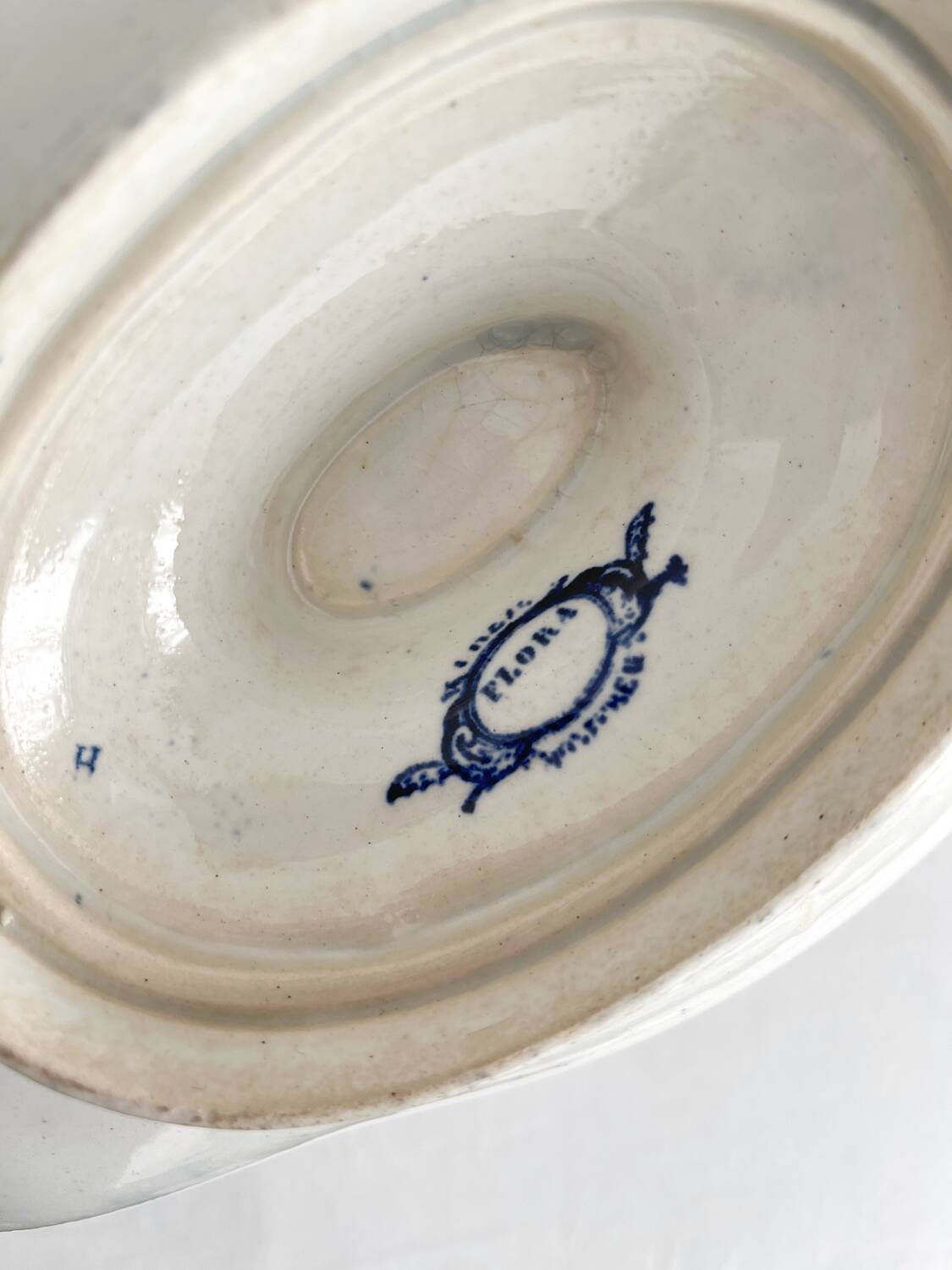 Old gravy boat in iron clay “Flora” Creil et Montereau