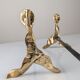 Pair of sculptural brutalist bronze fireplace andirons, 1970s