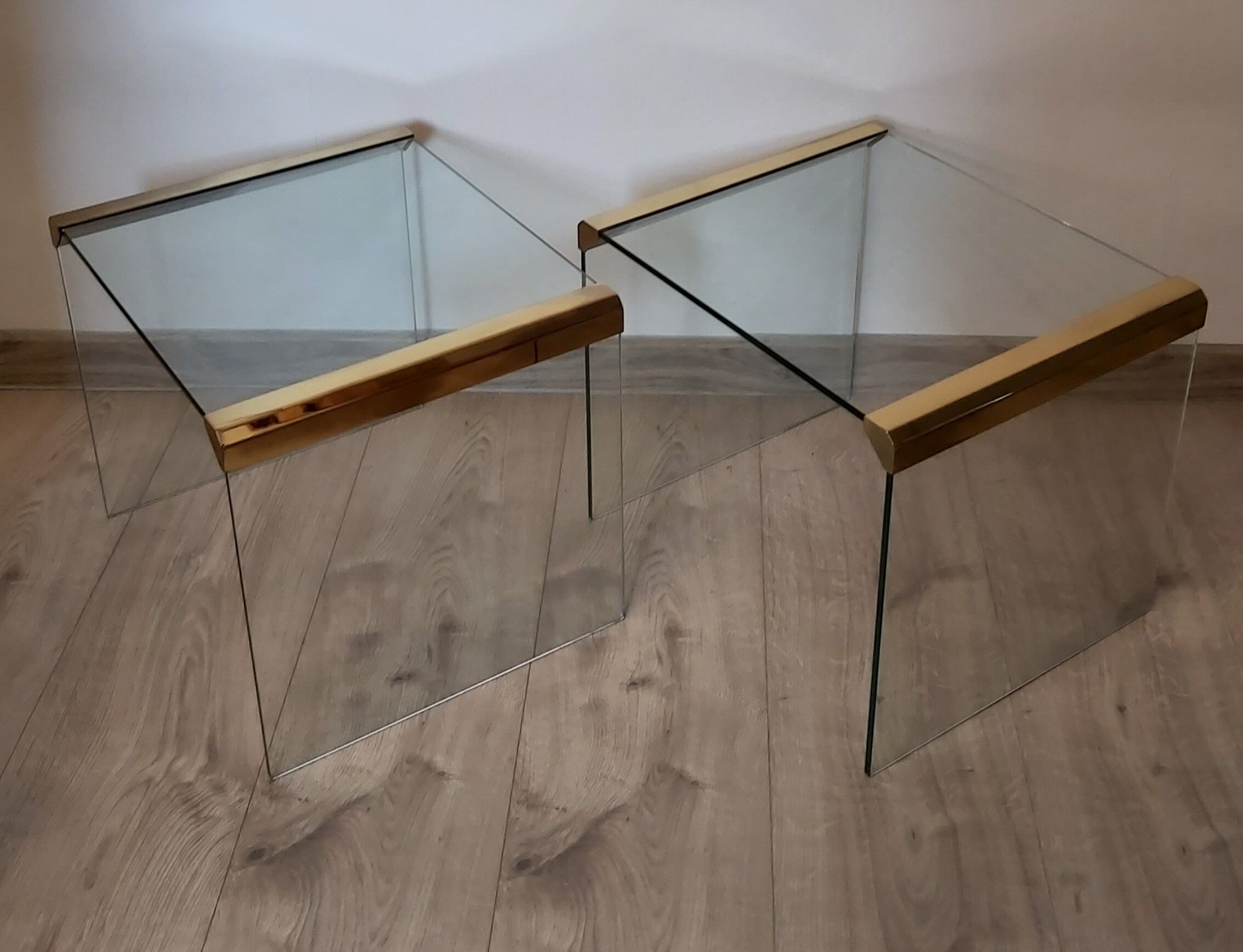 A pair of glass tables, designed by L. Rosen, Pace Collection, USA, 1970