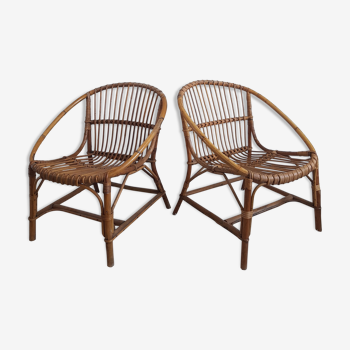 Pair of rattan armchairs in basket shape circa 1960
