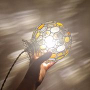 Vintage globe pendant light with stained glass effect