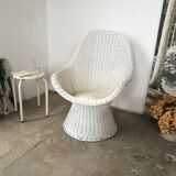 Braided rattan armchair