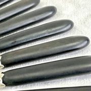 12 antique large table knives with ebony handles from the Napoleonic III period.