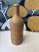 Bouteille ancienne en terre