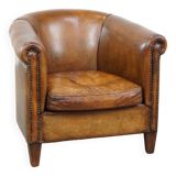 Club chair made of sheepskin leather with the most beautiful colors and a stunning patina